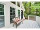 Front porch with a seating area and a view of the surrounding neighborhood at 3861 Hanover Ct, Marietta, GA 30062