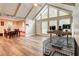 Open-concept living room with vaulted ceilings, a fireplace, and hardwood floors at 3861 Hanover Ct, Marietta, GA 30062