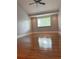 Spacious bedroom featuring hardwood floors, natural light, and recessed lighting at 1055 Worthington Hills Dr, Roswell, GA 30076