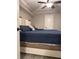 Bedroom featuring a ceiling fan and a comfortable bed with navy blue comforter at 1055 Worthington Hills Dr, Roswell, GA 30076