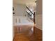 Entryway with hardwood floors, painted walls, and stairs leading to the second floor at 1055 Worthington Hills Dr, Roswell, GA 30076