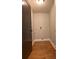 Laundry room featuring hardwood floors, neutral paint and laundry hookups at 1055 Worthington Hills Dr, Roswell, GA 30076