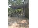 Covered back porch featuring decorative carpentry and refinished wood floor at 1055 Worthington Hills Dr, Roswell, GA 30076