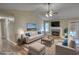 Living room featuring a stone fireplace, hardwood flooring, and neutral walls at 160 Riverbrooke Trl, Covington, GA 30016