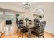 Inviting dining area with hardwood floors, stylish lighting, and seamless flow to living spaces at 1928 Stancrest Nw Trce, Kennesaw, GA 30152