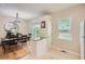 The kitchen includes an island with bar seating, pendant lighting, and a refrigerator at 1928 Stancrest Nw Trce, Kennesaw, GA 30152