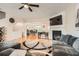 Open living room and dining area with hardwood floors, lots of natural light, and comfortable seating at 1928 Stancrest Nw Trce, Kennesaw, GA 30152