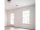 Airy bedroom includes a window for natural light and access to the outside at 21 Whitegrass Way, Grayson, GA 30017