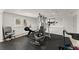 Basement gym featuring exercise equipment and plenty of space at 300 Morganshire Pl, Atlanta, GA 30350