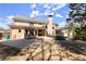 Exterior view of backyard featuring patio and lush greenery at 300 Morganshire Pl, Atlanta, GA 30350