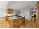 Bright kitchen features a center island with granite countertops and stainless steel appliances at 300 Morganshire Pl, Atlanta, GA 30350