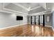 Spacious main bedroom with hardwood floors and a bay window sitting area at 300 Morganshire Pl, Atlanta, GA 30350