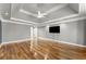 Expansive main bedroom with hardwood flooring and ample space for relaxing and unwinding at 300 Morganshire Pl, Atlanta, GA 30350