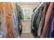 Walk-in closet with window and ample hanging storage at 4131 N Gloucester Pl, Atlanta, GA 30341
