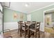 Dining room boasts decorative wall trim and a view into backyard at 4131 N Gloucester Pl, Atlanta, GA 30341
