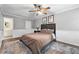 Cozy main bedroom with plush bedding and decorative accents at 4131 N Gloucester Pl, Atlanta, GA 30341