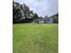 Charming home featuring a spacious backyard, offering plenty of room for outdoor living and recreation at 4925 Happy Hollow Rd, Dunwoody, GA 30360