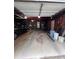 Spacious garage featuring ample storage space, room for parking, and access to both the interior and exterior at 4925 Happy Hollow Rd, Dunwoody, GA 30360