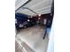 Spacious garage featuring ample storage space, room for parking, and access to both the interior and exterior at 4925 Happy Hollow Rd, Dunwoody, GA 30360