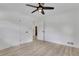 Bedroom featuring a ceiling fan, neutral paint, and a doorway to the hallway at 644 Church Nw St, Atlanta, GA 30318