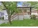 Charming exterior view of home with front porch, painted brick, and landscaped front yard at 644 Church Nw St, Atlanta, GA 30318
