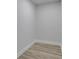 Bright pantry with light wood floor, white walls and baseboards offers ample storage space at 644 Church Nw St, Atlanta, GA 30318