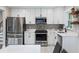 Updated kitchen features stainless steel appliances, white cabinetry, and a clean, bright design at 1934 Glen Echo Dr, Decatur, GA 30032
