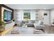 Sunlit living room with stylish decor, comfortable sofa, and modern furnishings at 1934 Glen Echo Dr, Decatur, GA 30032