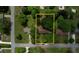 Lot aerial featuring well-maintained lawn and mature tree coverage at 2368 Ellis Court, Snellville, GA 30078