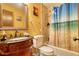 The bathroom features a vanity with granite top, a standard toilet, and a shower/tub combination at 2368 Ellis Court, Snellville, GA 30078