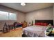 Bedroom features a neutral color scheme, bright natural light, and minimalist decor at 2368 Ellis Court, Snellville, GA 30078