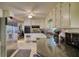 Eat-in kitchen with white cabinets, dark countertops, and stainless steel appliances at 2368 Ellis Court, Snellville, GA 30078