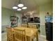 The kitchen features a dining table and attached shelving space perfect for storage or appliances at 2368 Ellis Court, Snellville, GA 30078