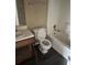 This bathroom features a vanity, toilet and shower with a tub at 432 Manor Estates Dr, Stockbridge, GA 30281