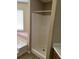 This bathroom features a stand-up shower and a soaking tub near a window at 432 Manor Estates Dr, Stockbridge, GA 30281