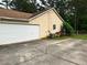 The home features a two-car garage and a large paved driveway at 432 Manor Estates Dr, Stockbridge, GA 30281