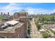 An elevated view shows Ponce City Market with a street view and cityscape skyline in the background at 542 Ralph Mcgill Ne Blvd # 7, Atlanta, GA 30312
