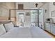 Bright bedroom showcasing stylish decor, a four-poster bed, and a private outdoor entrance at 542 Ralph Mcgill Ne Blvd # 7, Atlanta, GA 30312