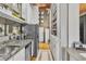 Bright kitchen featuring granite countertops, stainless steel appliances, and ample storage space with wood floors at 542 Ralph Mcgill Ne Blvd # 7, Atlanta, GA 30312