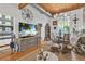 Bright open living space features a kitchen, dining area, and comfortable living area with a large screen tv at 542 Ralph Mcgill Ne Blvd # 7, Atlanta, GA 30312