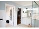 Bathroom with a marble vanity and a clear glass shower enclosure at 762 Thompson Ln, Loganville, GA 30052