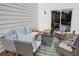 Outdoor deck featuring comfortable seating and a stylish outdoor rug at 762 Thompson Ln, Loganville, GA 30052