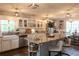 Charming kitchen featuring granite counters, a central island, and stainless steel appliances at 762 Thompson Ln, Loganville, GA 30052
