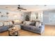 Comfortable living room with large sectional sofa, stylish decor, and natural light at 762 Thompson Ln, Loganville, GA 30052