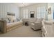 Charming Bedroom with blue and white checkered wallpaper, daybed and rocking chair at 9056 Riverbend Mnr, Alpharetta, GA 30022