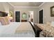 Bedroom featuring a queen bed and a smaller daybed at 9056 Riverbend Mnr, Alpharetta, GA 30022
