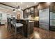 Spacious kitchen featuring stainless steel appliances and an island with bar stool seating at 9056 Riverbend Mnr, Alpharetta, GA 30022