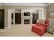 Cozy sitting area with a fireplace, perfect for relaxing or reading in a quiet space at 9056 Riverbend Mnr, Alpharetta, GA 30022