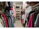 Organized walk-in closet with ample shelving, hanging space, and shoe storage at 9056 Riverbend Mnr, Alpharetta, GA 30022