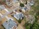 Aerial view of a beautiful home with mature trees at 1007 Fairway Seven, Villa Rica, GA 30180